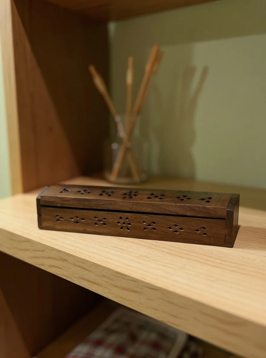 The carved incense box photographed in the Cozy Shelf scene