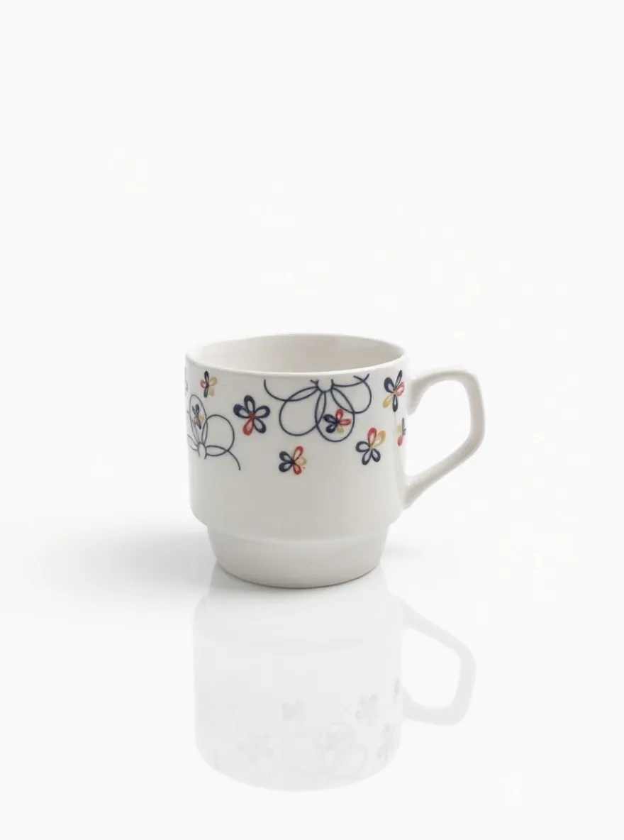 The ceramic mug photographed in the Studio White scene