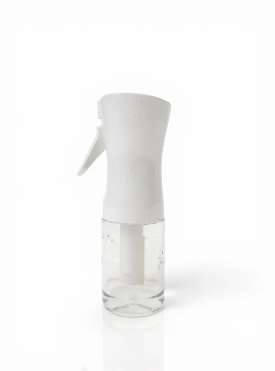 The glass spray bottle photographed in the Studio White scene